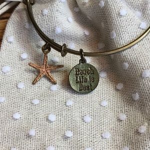 Starfish charm bracelet with beach life quote.